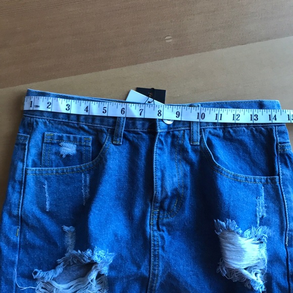 Distressed denim mini skirt - Picture 7 of 8